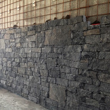 Sone wall cladding in interior - Dark Gray