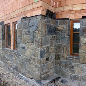 Realization of stone facade - Massive Rock