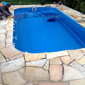 Stone tiles in the pool - Solid Quartzite