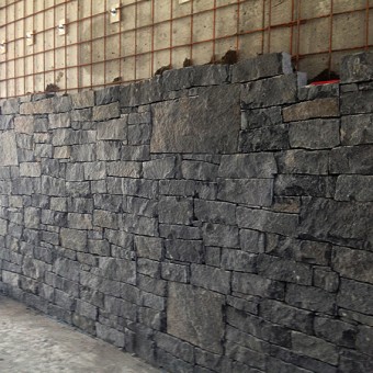 Stone wall cladding in interior - Dark Grey